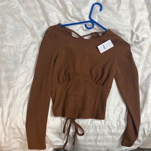 Brown blouse brought at buckle never one with tags on